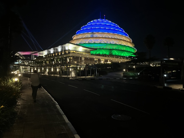 Kigali Convention Centre dome illuminated at night. (Image: WCRP/Megha Kaveri)